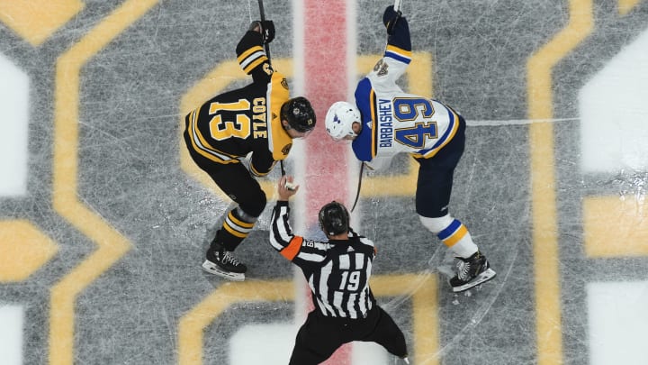 BOSTON, MA – JUNE 12: Charlie Coyle #13 of the Boston Bruins faces off against Ivan Barbashev #49 of the St. Louis Blues in Game Seven of the Stanley Cup Final during the 2019 NHL Stanley Cup Playoffs at the TD Garden on June 12, 2019 in Boston, Massachusetts. (Photo by Steve Babineau/NHLI via Getty Images)