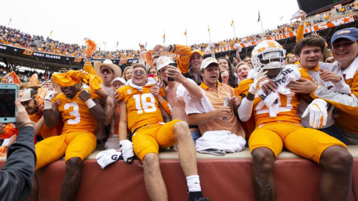 KNOXVILLE, TN - OCTOBER 12: Eric Gray #3, Brian Maurer #18, and Bryce Thompson #20 of the Tennessee Volunteers celebrate with fans after defeating the Mississippi State Bulldogs 20-10 at Neyland Stadium on October 12, 2019 in Knoxville, Tennessee. (Photo by Carmen Mandato/Getty Images)