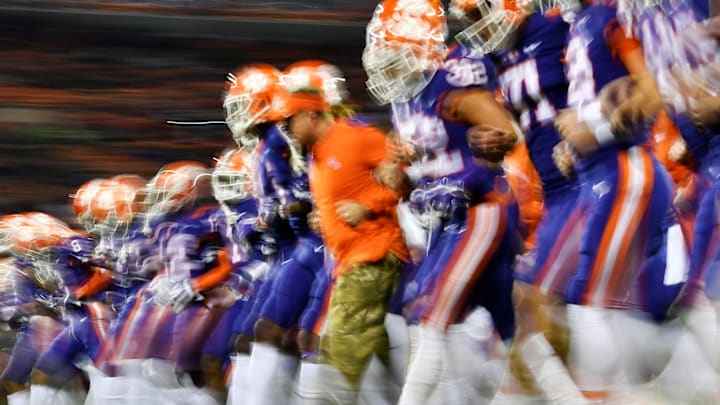 CLEMSON, SOUTH CAROLINA – NOVEMBER 17: The Clemson Tigers link arms and walk toward their end zone for their traditional “face off” prior to their football game against the Duke Blue Devils at Clemson Memorial Stadium on November 17, 2018 in Clemson, South Carolina. (Photo by Mike Comer/Getty Images)