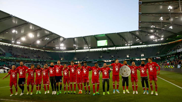 WOLFSBURG, GERMANY - APRIL 29: The team of Bayern celebrates winning the German Championship after winning 6-0 the Bundesliga match between VfL Wolfsburg and Bayern Muenchen at Volkswagen Arena on April 29, 2017 in Wolfsburg, Germany. (Photo by Christof Koepsel/Getty Images for MAN)