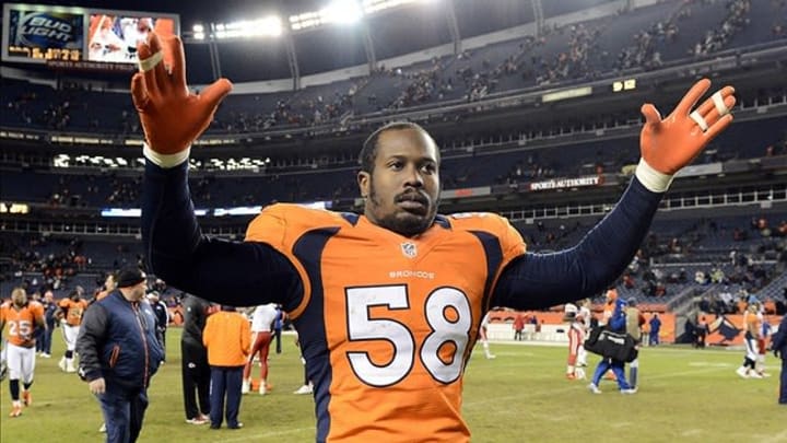 Dec 30 2012; Denver, CO, USA; Denver Broncos outside linebacker Von Miller (58) reacts following the win over the Kansas City Chiefs at Sports Authority Field. The Broncos defeated the Chiefs 38-3. Mandatory Credit: Ron Chenoy-USA TODAY Sports