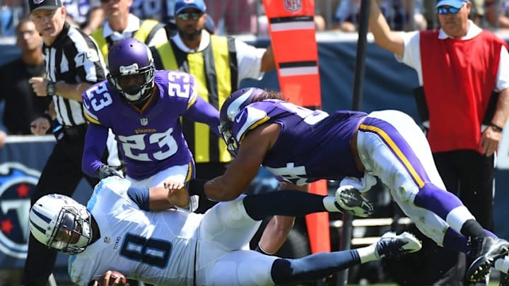Sep 11, 2016; Nashville, TN, USA; Tennessee Titans quarterback Marcus Mariota (8) is tackled after a short gain against the Minnesota Vikings at Nissan Stadium. Mandatory Credit: Christopher Hanewinckel-USA TODAY Sports