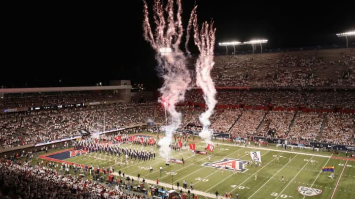 TUCSON, ARIZONA - SEPTEMBER 14: The Arizona Wildcats run onto the field before the start of the NCAAF game against the Texas Tech Red Raiders at Arizona Stadium on September 14, 2019 in Tucson, Arizona. (Photo by Christian Petersen/Getty Images)