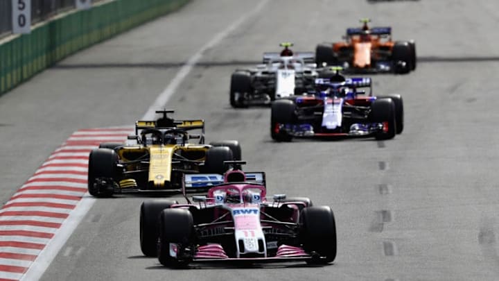 BAKU, AZERBAIJAN - APRIL 29: Sergio Perez of Mexico driving the (11) Sahara Force India F1 Team VJM11 Mercedes leads Nico Hulkenberg of Germany driving the (27) Renault Sport Formula One Team RS18 (Photo by Mark Thompson/Getty Images)
