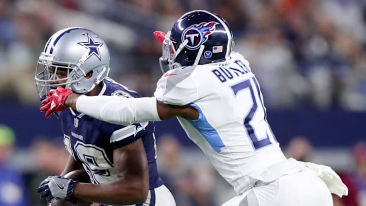ARLINGTON, TX - NOVEMBER 05: Amari Cooper #19 of the Dallas Cowboys carries the ball against Malcolm Butler #21 of the Tennessee Titans in the second quarter at AT&T Stadium on November 5, 2018 in Arlington, Texas. (Photo by Tom Pennington/Getty Images)