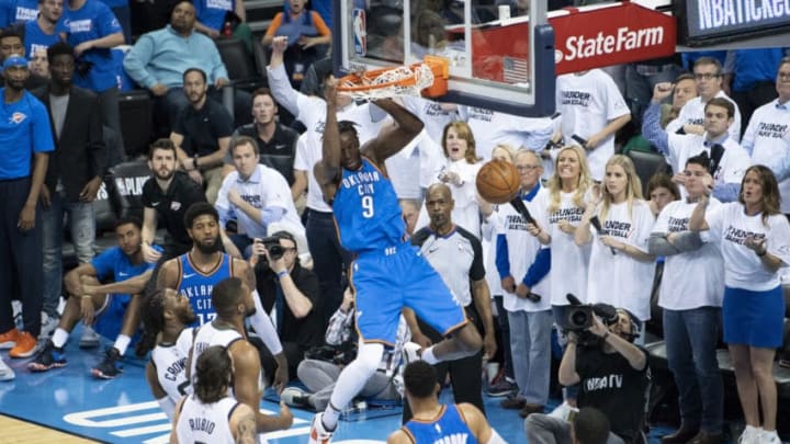 OKLAHOMA CITY, OK – APRIL 25: Jerami Grant #9 of the Oklahoma City Thunder dunks two points during game 5 of the Western Conference playoffs at the Chesapeake Energy Arena on April 25, 2018 in Oklahoma City, Oklahoma. NOTE TO USER: User expressly acknowledges and agrees that, by downloading and or using this photograph, User is consenting to the terms and conditions of the Getty Images License Agreement. (Photo by J Pat Carter/Getty Images)