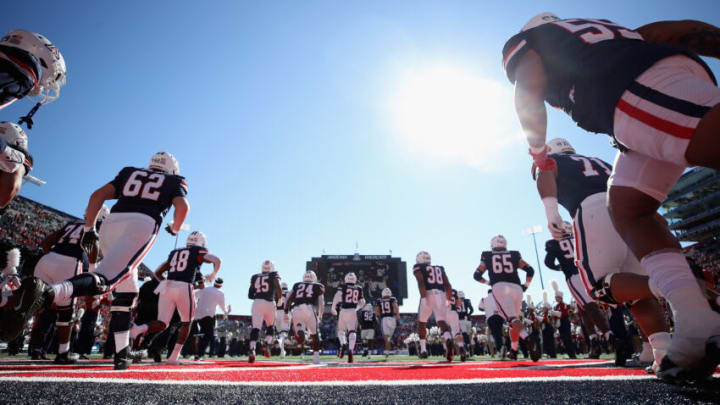 TUCSON, ARIZONA - NOVEMBER 25: The Arizona Wildcats run onto the field before the NCAAF game against the Arizona State Sun Devils at Arizona Stadium on November 25, 2022 in Tucson, Arizona. This year's game is the 96th annual Territorial Cup match between Arizona rival schools. (Photo by Christian Petersen/Getty Images)