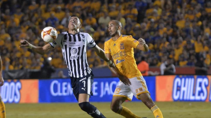 Guido Pizarro (right) and his Tigres mates won't have to deal with Monterrey striker Rogelio Funes Mori during Saturday's "Clásico Regiomontano," arguably the most attractive derby in Liga MX. (Photo by Azael Rodriguez/Getty Images)