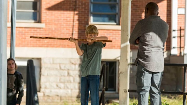 Lennie James as Morgan Jones, Macsen Lintz as Henry, Logan Miller as Benjamin - The Walking Dead _ Season 7, Episode 14 - Photo Credit: Gene Page/AMC