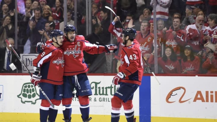WASHINGTON, DC - JANUARY 14: Alex Ovechkin #8 of the Washington Capitals celebrates with Dmitry Orlov #9 and Tom Wilson #43 after scoring a goal against the St. Louis Blues in the first period at Capital One Arena on January 14, 2019 in Washington, DC. (Photo by Patrick McDermott/NHLI via Getty Images)
