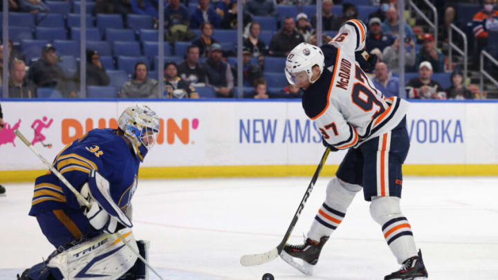 Buffalo Sabres goaltender Dustin Tokarski (31) watches as Edmonton Oilers center Connor McDavid (97) Mandatory Credit: Timothy T. Ludwig-USA TODAY Sports