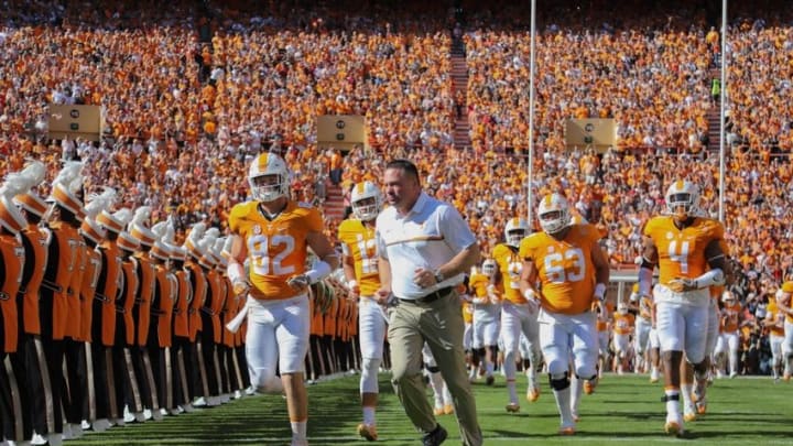 Oct 15, 2016; Knoxville, TN, USA; Tennessee Volunteers head coach Butch Jones runs on to the field before the game against the Alabama Crimson Tide at Neyland Stadium. Mandatory Credit: Randy Sartin-USA TODAY Sports