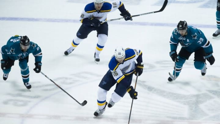 May 25, 2016; San Jose, CA, USA; St. Louis Blues defenseman Colton Parayko (55) controls the puck down ice ahead of San Jose Sharks right wing Joonas Donskoi (27) and center Logan Couture (39) with St. Louis Blues center Jori Lehtera (12) during the first period in game six of the Western Conference Final of the 2016 Stanley Cup Playoffs at SAP Center at San Jose. Mandatory Credit: Kelley L Cox-USA TODAY Sports