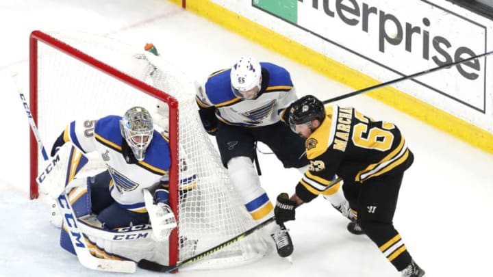 BOSTON, MA - JUNE 06: Boston Bruins left wing Brad Marchand (63) tries to stuff the puck past St. Louis Blues goalie Jordan Binnington (50) during Game 5 of the Stanley Cup Final between the Boston Bruins and the St. Louis Blues on June 6, 2019, at TD Garden in Boston, Massachusetts. (Photo by Fred Kfoury III/Icon Sportswire via Getty Images)
