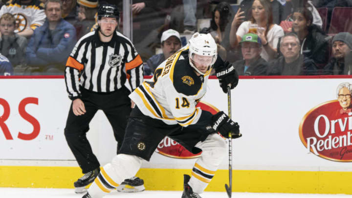 VANCOUVER, BC - FEBRUARY 22: Chris Wagner #14 of the Boston Bruins skates with the puck during NHL action against the Vancouver Canucks at Rogers Arena on February 22, 2020 in Vancouver, Canada. (Photo by Rich Lam/Getty Images)