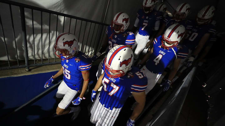 FRISCO, TX – DECEMBER 20: The Southern Methodist Mustangs walk to the field before the 2017 DXL Frisco Bowl against the Louisiana Tech Bulldogs on December 20, 2017 in Frisco, Texas. (Photo by Ronald Martinez/Getty Images)