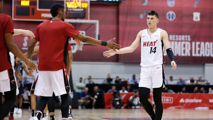LAS VEGAS, NEVADA - JULY 10: Tyler Herro #14 of the Miami Heat celebrates with teammates against the Minnesota Timberwolves during the 2019 Summer League at the Cox Pavilion on July 10, 2019 in Las Vegas, Nevada. NOTE TO USER: User expressly acknowledges and agrees that, by downloading and or using this photograph, User is consenting to the terms and conditions of the Getty Images License Agreement. (Photo by Michael Reaves/Getty Images)