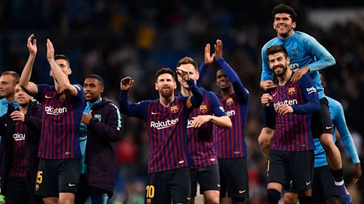 Barcelona players celebrate their win at the end of the Spanish league football match between Real Madrid CF and FC Barcelona at the Santiago Bernabeu stadium in Madrid on March 2, 2019. (Photo by OSCAR DEL POZO / AFP) (Photo credit should read OSCAR DEL POZO/AFP/Getty Images)