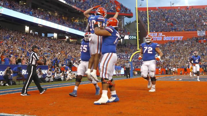 Sep 25, 2021; Gainesville, Florida, USA; Florida Gators running back Malik Davis (20) celebrates after scoring a touchdown against the Tennessee Volunteers during the first quarter at Ben Hill Griffin Stadium. Mandatory Credit: Kim Klement-USA TODAY Sports