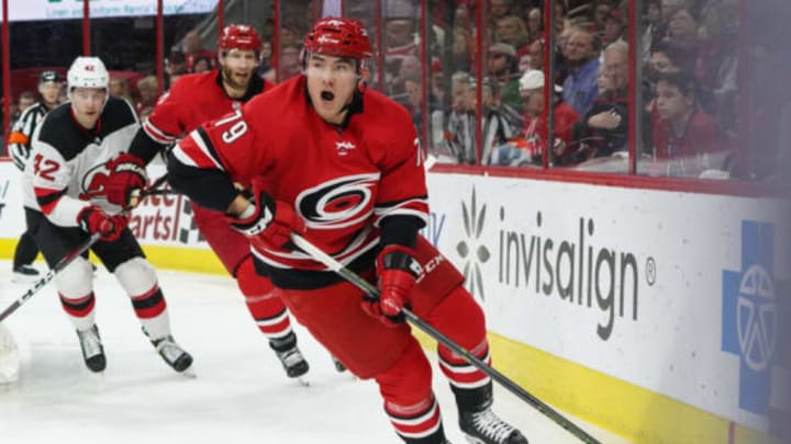 RALEIGH, NC – APRIL 04: Carolina Hurricanes Left Wing Micheal Ferland (79) skates the puck around the back of the net during a game between the New Jersey Devils and the Carolina Hurricanes at the PNC Arena in Raleigh, NC on April 4, 2019. (Photo by Greg Thompson/Icon Sportswire via Getty Images)