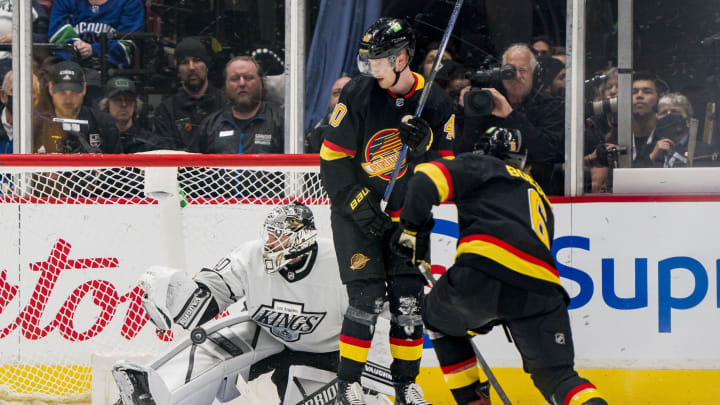 Apr 28, 2022; Vancouver, British Columbia, CAN; Vancouver Canucks forward Elias Pettersson (40) looks on as Los Angeles Kings goalie Cal Petersen (40) makes a save on forward Brock Boeser (6) in overtime at Rogers Arena. Canucks won 3-2 in overtime. Mandatory Credit: Bob Frid-USA TODAY Sports