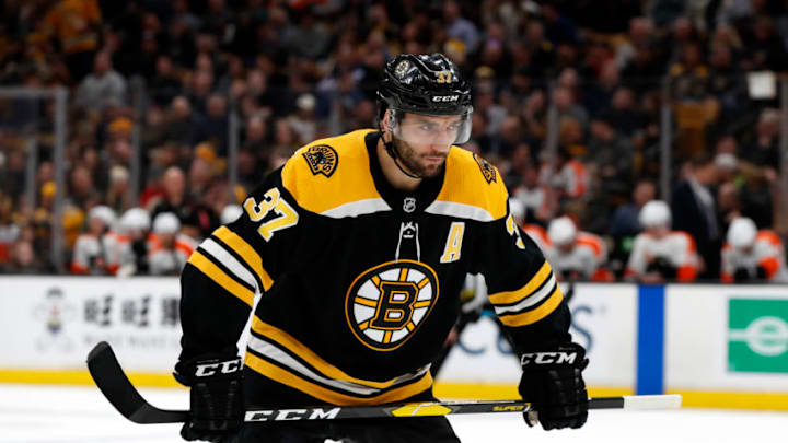 BOSTON, MA - OCTOBER 25: Boston Bruins center Patrice Bergeron (37) moves in for the draw during a game between the Boston Bruins and the Philadelphia Flyers on October 25, 2018, at TD Garden in Boston, Massachusetts. The Bruins defeated the Flyers 3-0. (Photo by Fred Kfoury III/Icon Sportswire via Getty Images)