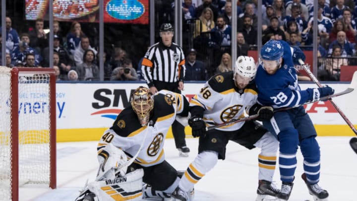 TORONTO, ON - APRIL 21: Toronto Maple Leafs Right Wing Connor Brown (28), Boston Bruins Defenceman Matt Grzelcyk (48) and Boston Bruins Goalie Tuukka Rask (40) watch the puck go into the net for a goal during Game 6 of the First Round Stanley Cup Playoffs series between the Boston Bruins and the Toronto Maple Leafs on April 21, 2019, at Scotiabank Arena in Toronto, ON. (Photo by Julian Avram/Icon Sportswire via Getty Images)