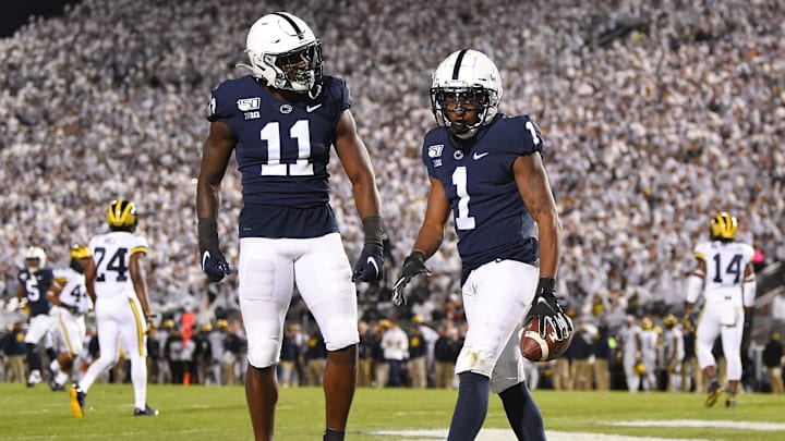 Oct 19, 2019; University Park, PA, USA; Penn State Nittany Lions wide receiver KJ Hamler (1) reacts to his touchdown catch with teammate wide receiver Daniel George (11) against the Michigan Wolverines during the fourth quarter at Beaver Stadium. Mandatory Credit: Rich Barnes-USA TODAY Sports