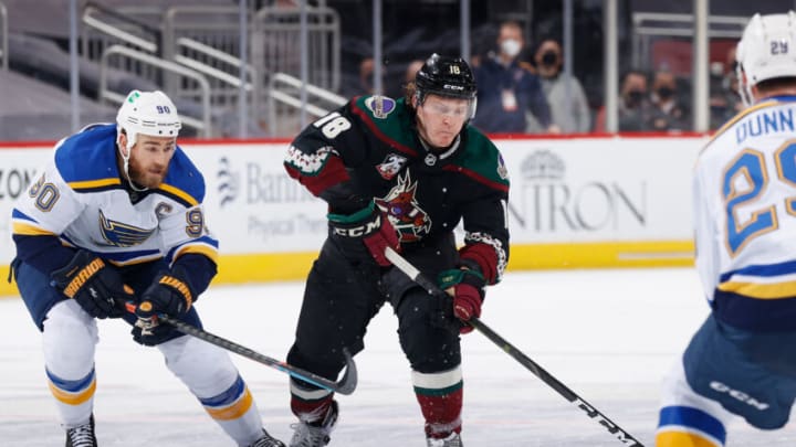 GLENDALE, ARIZONA - FEBRUARY 15: Christian Dvorak #18 of the Arizona Coyotes skates with the puck against the St. Louis Blues during the third period of the NHL game at Gila River Arena on February 15, 2021 in Glendale, Arizona. The Coyotes defeated the Blues 1-0. (Photo by Christian Petersen/Getty Images)
