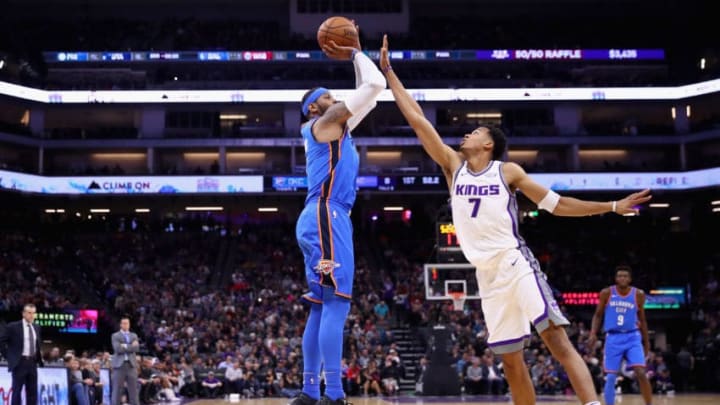 SACRAMENTO, CA - NOVEMBER 07: Carmelo Anthony #7 of the OKC Thunder shoots over Skal Labissiere #7 of the Sacramento Kings at Golden 1 Center on November 7, 2017 in Sacramento, California. (Photo by Ezra Shaw/Getty Images)