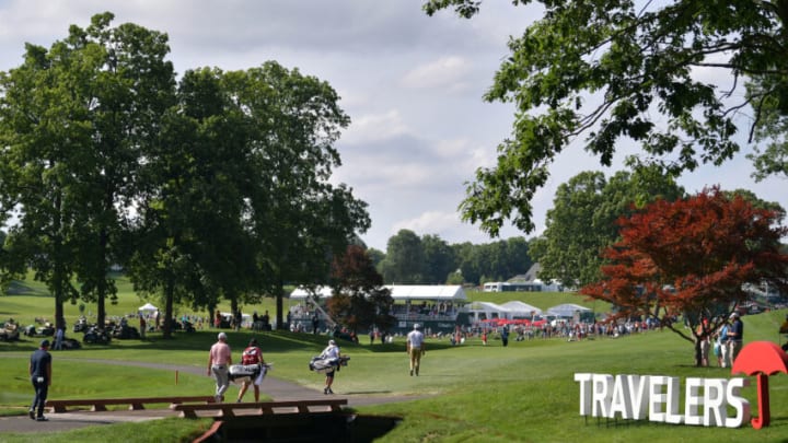 CROMWELL, CONNECTICUT - JUNE 25: Patrick Reed of the United States, Stewart Cink of the United States and Bryson DeChambeau of the United States walk to the 15th fairway during the second round of the Travelers Championship at TPC River Highlands on June 25, 2021 in Cromwell, Connecticut. (Photo by Drew Hallowell/Getty Images)