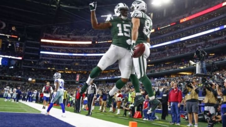 Dec 19, 2015; Arlington, TX, USA; New York Jets wide receiver Eric Decker (87) celebrates with wide receiver Brandon Marshall (15) after scoring a touchdown against the Dallas Cowboys during the second half at AT&T Stadium. Mandatory Credit: Kevin Jairaj-USA TODAY Sports