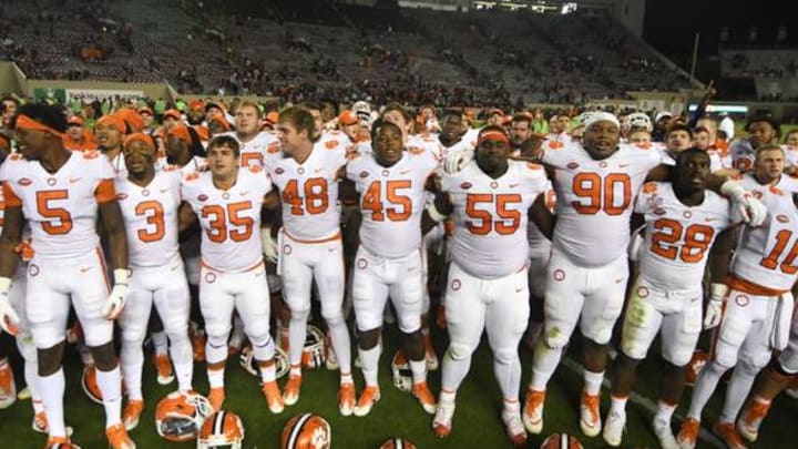 BLACKSBURG, VA – SEPTEMBER 30: The Clemson Tigers sing their fight song on the field after their victory over the Virginia Tech Hokies at Lane Stadium on September 30, 2017 in Blacksburg, Virginia. (Photo by Michael Shroyer/Getty Images)