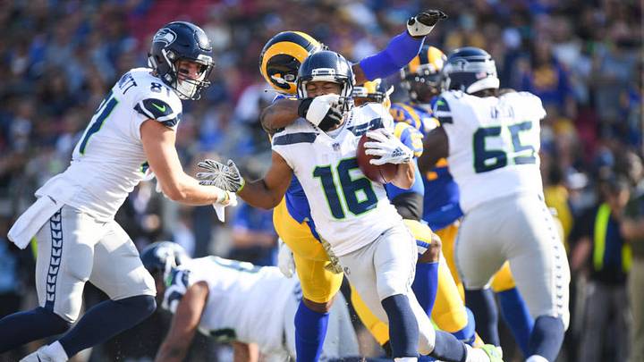 LOS ANGELES, CA - NOVEMBER 11: Wide receiver Tyler Lockett #16 of the Seattle Seahawks is tackled from behind by defensive end Dante Fowler #56 of the Los Angeles Rams in the first quarter at Los Angeles Memorial Coliseum on November 11, 2018 in Los Angeles, California. (Photo by Harry How/Getty Images) LOS ANGELES, CA - NOVEMBER 11: Wide receiver Tyler Lockett #16 of the Seattle Seahawks is tackled from behind by defensive end Dante Fowler #56 of the Los Angeles Rams in the first quarter at Los Angeles Memorial Coliseum on November 11, 2018 in Los Angeles, California. (Photo by Harry How/Getty Images)