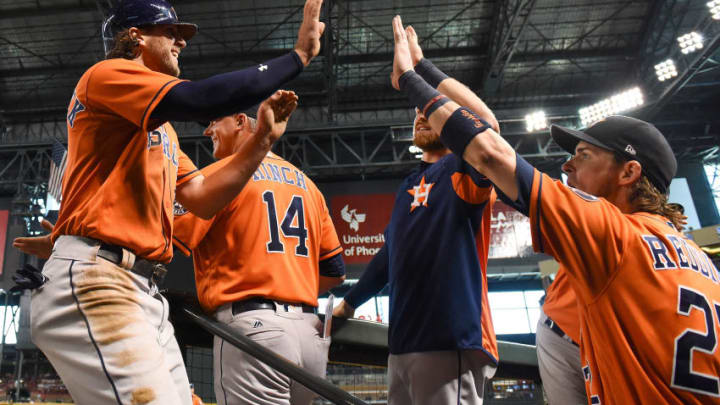 PHOENIX, AZ - AUGUST 15: Jake Marisnick #6 of the Houston Astros is congratulated by Josh Reddick #22 after scoring against the Arizona Diamondbacks in the third inning at Chase Field on August 15, 2017 in Phoenix, Arizona. (Photo by Jennifer Stewart/Getty Images)