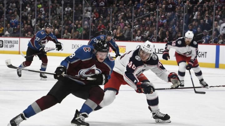 DENVER, CO - NOVEMBER 09: Cale Makar (8) of the Colorado Avalanche chases down the puck against the defense of Dean Kukan (46) of the Columbus Blue Jackets in the third period at the Pepsi Center November 09, 2019. (Photo by Andy Cross/MediaNews Group/The Denver Post via Getty Images)