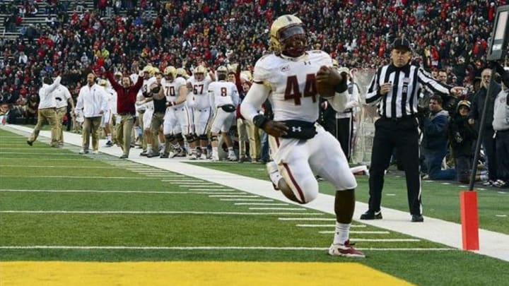 Nov 23, 2013; College Park, MD, USA; Boston College Eagles running back Andre Williams (44) runs into the end zone for a touchdown during the first half of the game against the Maryland Terrapins at Byrd Stadium. Mandatory Credit: Tommy Gilligan-USA TODAY Sports