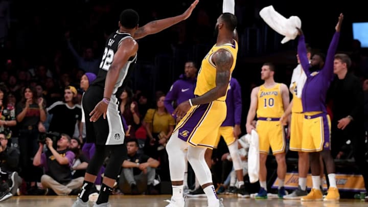LOS ANGELES, CA - OCTOBER 22: LeBron James #23 of the Los Angeles Lakers makes a three pointer in front of Rudy Gay #22 of the San Antonio Spurs to tie the game 128-128 during a 143-142 overtime Laker loss at Staples Center on October 22, 2018 in Los Angeles, California. (Photo by Harry How/Getty Images)