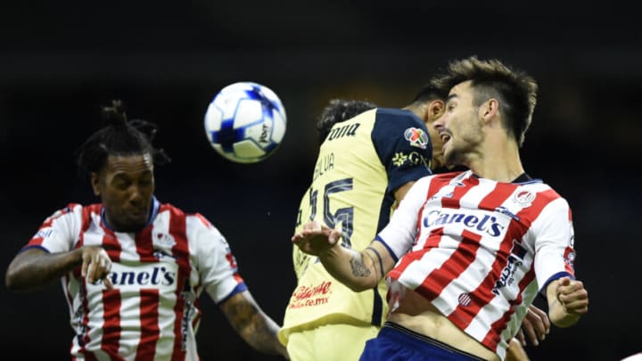 Atlético de San Luis defender Unai Bilbao (left) got the visiting Tuneros on the board first in his team's 3-2 win at América. (Photo by CLAUDIO CRUZ/AFP via Getty Images)