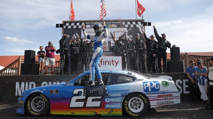 LEXINGTON, OHIO - AUGUST 10: Austin Cindric, driver of the #22 PPG Ford, celebrates after winning the B&L Transport 170 at Mid-Ohio Sports Car Course on August 10, 2019 in Lexington, Ohio. (Photo by Meg Oliphant/Getty Images)