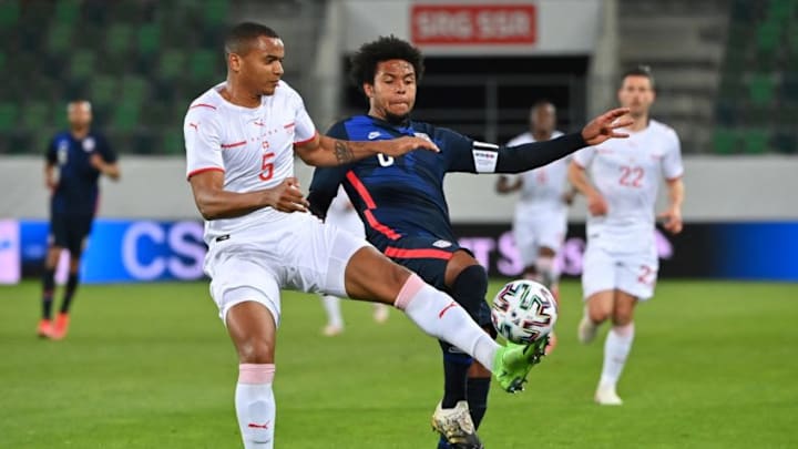 Manuel Akanji in action for Switzerland (Photo by FABRICE COFFRINI/AFP via Getty Images)