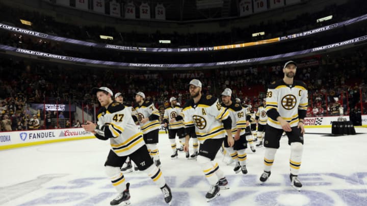 RALEIGH, NORTH CAROLINA - MAY 16: Torey Krug #47, David Krejci #46 and Zdeno Chara #33 of the Boston Bruins celebrate after defeating the Carolina Hurricanes in Game Four to win the Eastern Conference Finals during the 2019 NHL Stanley Cup Playoffs at PNC Arena on May 16, 2019 in Raleigh, North Carolina. (Photo by Bruce Bennett/Getty Images)