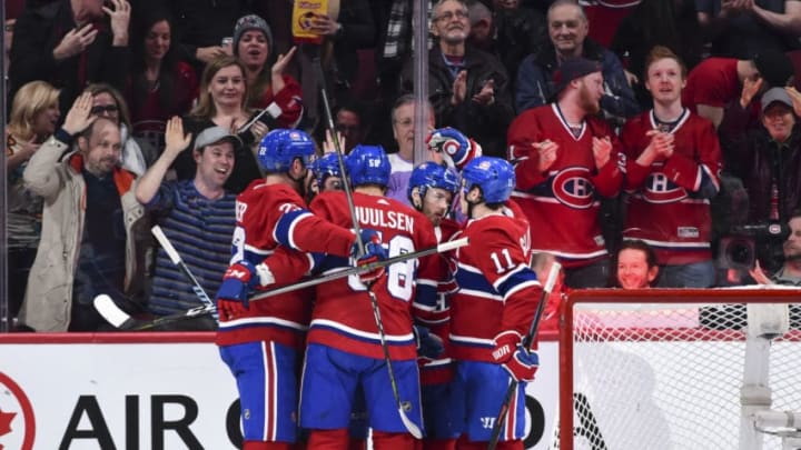 MONTREAL, QC - APRIL 03: Paul Byron #41 of the Montreal Canadiens celebrates his third period goal with teammates against the Winnipeg Jets during the NHL game at the Bell Centre on April 3, 2018 in Montreal, Quebec, Canada. The Winnipeg Jets defeated the Montreal Canadiens 5-4 in overtime. (Photo by Minas Panagiotakis/Getty Images)