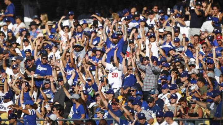 LOS ANGELES, CALIFORNIA - JUNE 26: Fans fill the stands for the game between the Los Angeles Dodgers and the Chicago Cubs at Dodger Stadium on June 26, 2021 in Los Angeles, California. (Photo by Meg Oliphant/Getty Images)