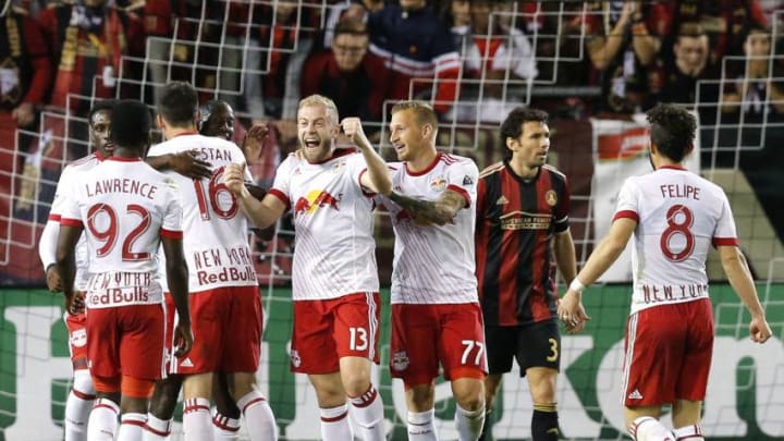 ATLANTA, GA - MARCH 05: Members of the New York Red Bulls celebrate after scoring the go-ahead goal during the game against Atlanta United at Bobby Dodd Stadium on March 5, 2017 in Atlanta, Georgia. (Photo by Mike Zarrilli/Getty Images)