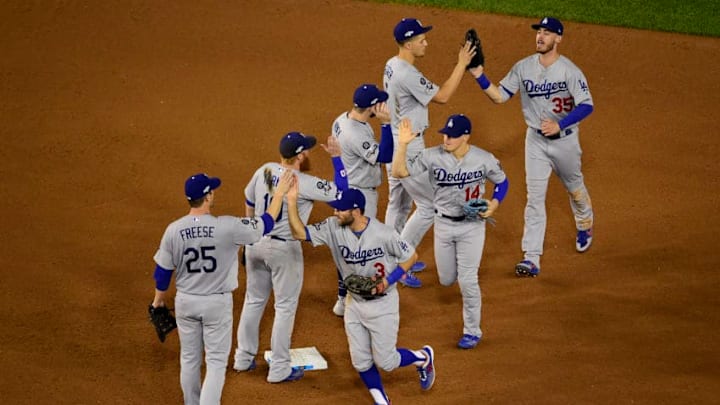 WASHINGTON, DC - OCTOBER 06: The Los Angeles Dodgers celebrate after the final out of Game 3 of the NLDS to defeat the Washington Nationals 10-4 at Nationals Park on October 6, 2019 in Washington, DC. (Photo by Patrick McDermott/Getty Images)