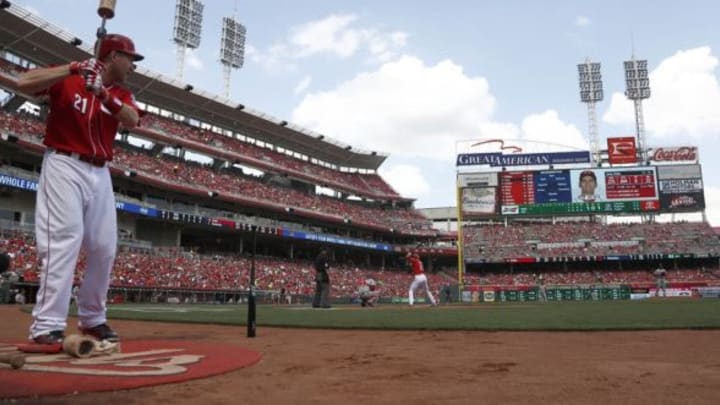 Cincinnati Reds third baseman Todd Frazier (21) prepares on deck in the first inning against the Washington Nationals at Great American Ball Park. Mandatory Credit: David Kohl-USA TODAY Sports