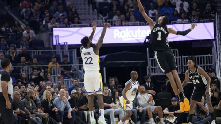 Andrew Wiggins and Victor Wembanyama. Photo by Thearon W. Henderson/Getty Images