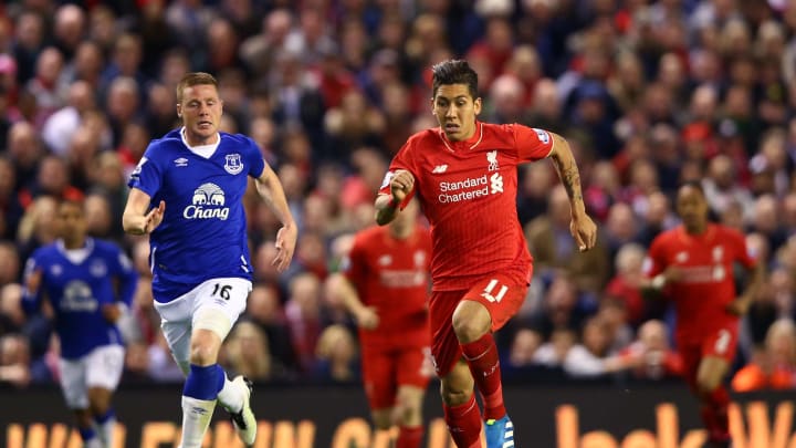 LIVERPOOL, ENGLAND – APRIL 20: James McCarthy of Everton chases down Roberto Firmino of Liverpool during the Barclays Premier League match between Liverpool and Everton at Anfield, April 20, 2016, Liverpool, England (Photo by Clive Brunskill/Getty Images)