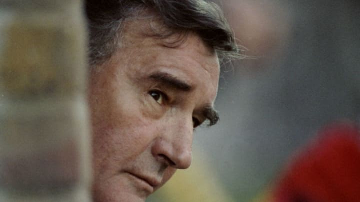 4 Nov 1989: Portrait of Fisher Athletic Manager Malcolm Allison peering from the dugout during the GM Vauxhall Conference match against Stafford Rovers at the Salter Road ground in England. Stafford Rovers won the match 2-0. \ Mandatory Credit: Allsport /Allsport